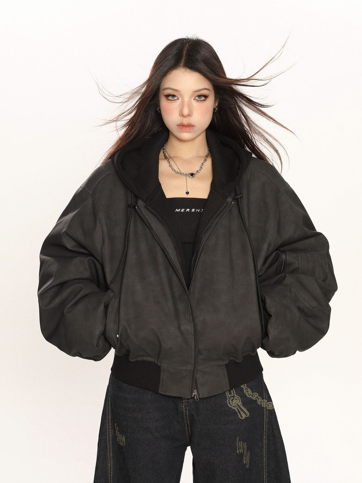 BIGGOLD STUDIO Layered Hooded Faux Leather Bomber in Gray - On Model #color_gray