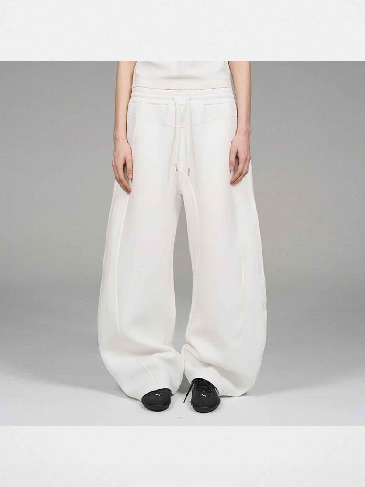 Blindnoplan Heavyweight Curved Leg Sweatpants in White - On Model