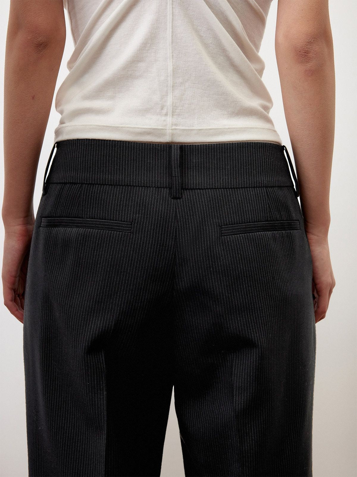 RandomPiece Pinstripe Wool Blend Bermuda Shorts in Black - On Model