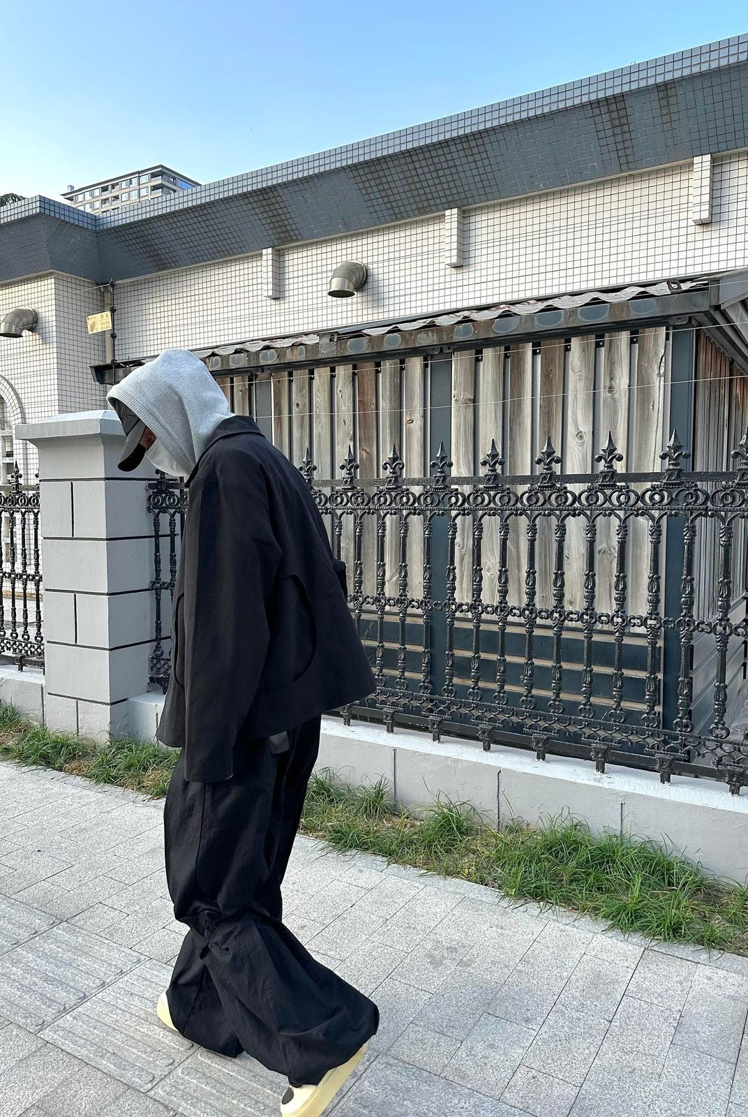 TRIANGLE PROJECT Deconstructed Origami Flare Pants in Black - On Model