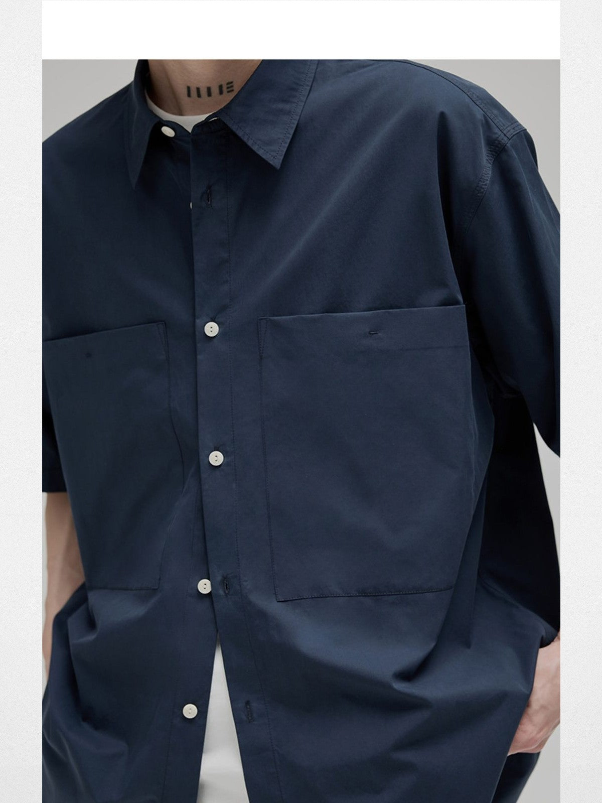 NANS Sand Washed Cotton Curved Hem Shirt in Navy Blue - On Model