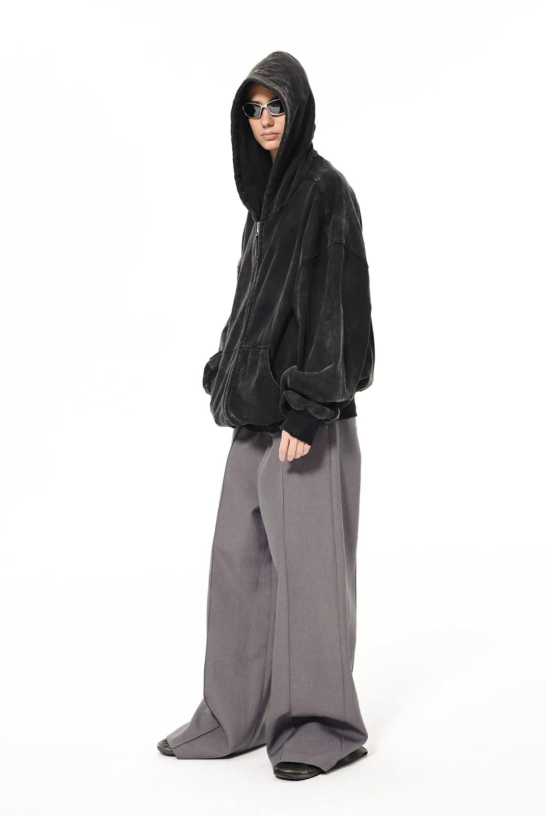 UNKNOWNWORLD Mud Dyed Zip Up Hoodie in Black - On Model