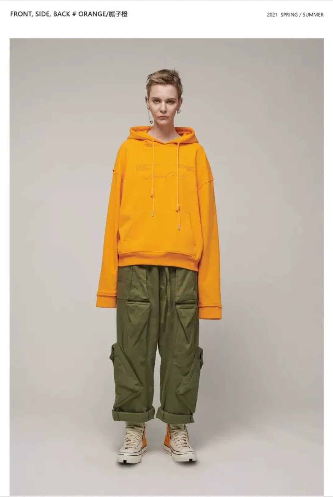 LOSTCTRL Embroidered Raw Edge Cotton Hoodie in Orange - On Model