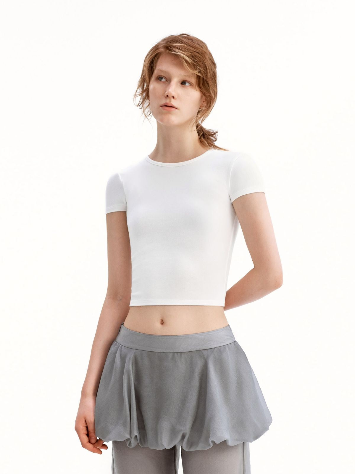 PUKI Open Back Bow Detail T Shirt in White - On Model