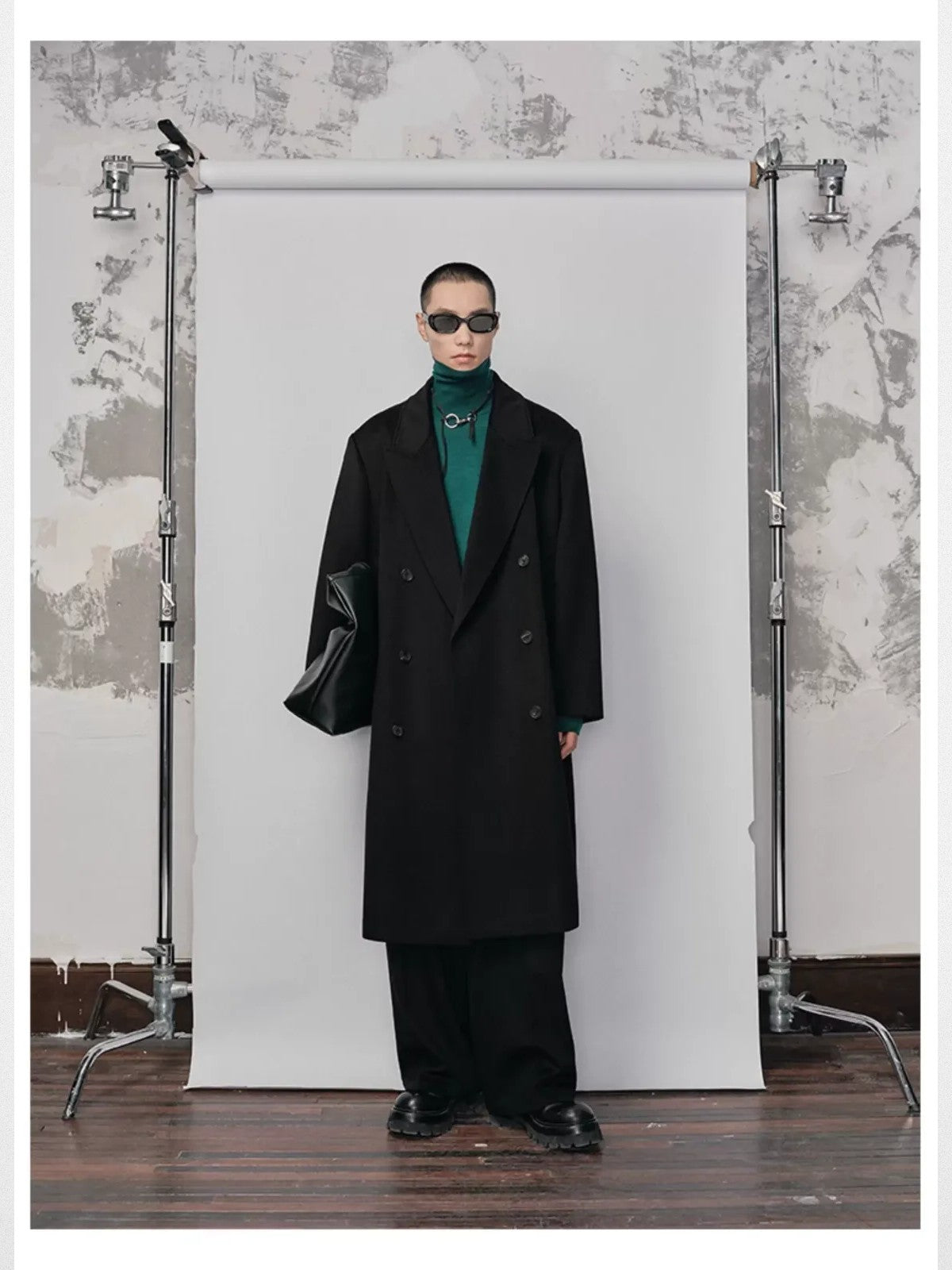 NANS Double Breasted Peak Lapel Wool Coat in Black - On Female Model