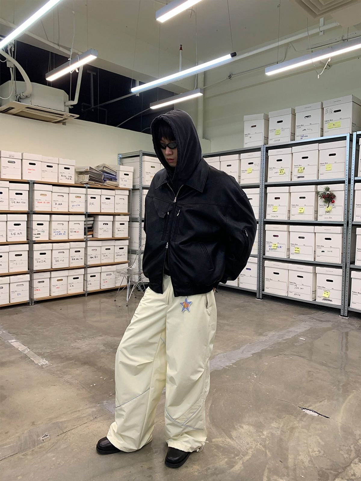 NeverSeez Leather Down Puffer Jacket in Black - On Male Model