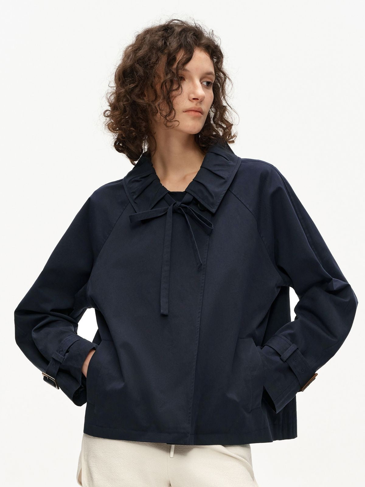 PUKI Short Trench Jacket with Bow Detail in Navy Blue - On Model