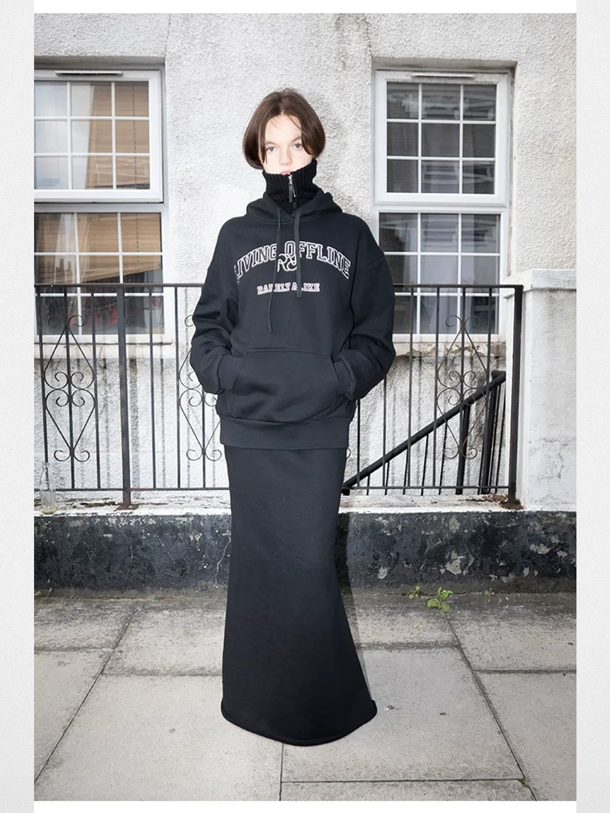 RARELY ALIKE Zip Up High Neck Wool Knit in Black - On Model