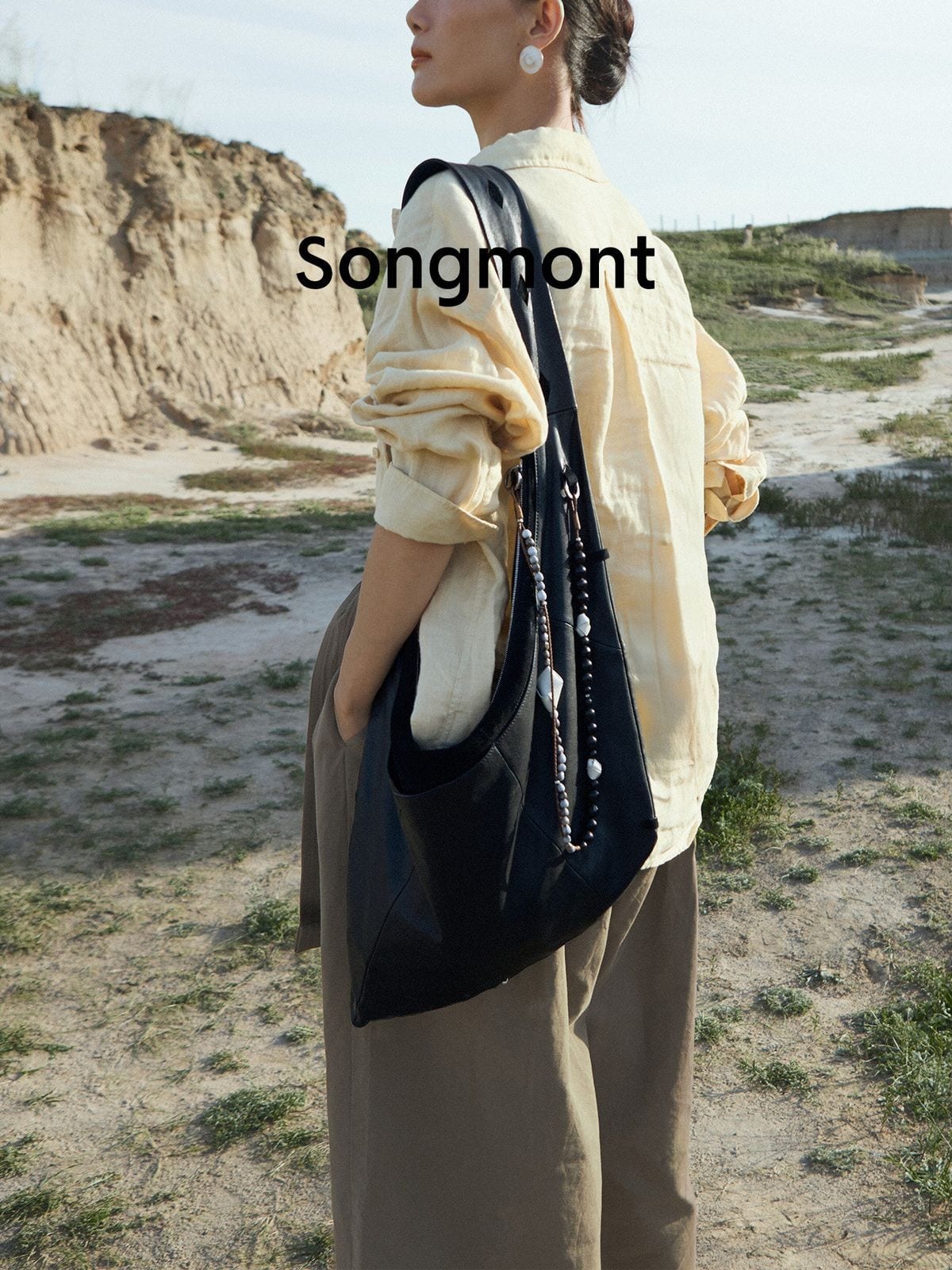 Songmont Broken Shell Leather Crossbody Hobo in Black - Lifestyle