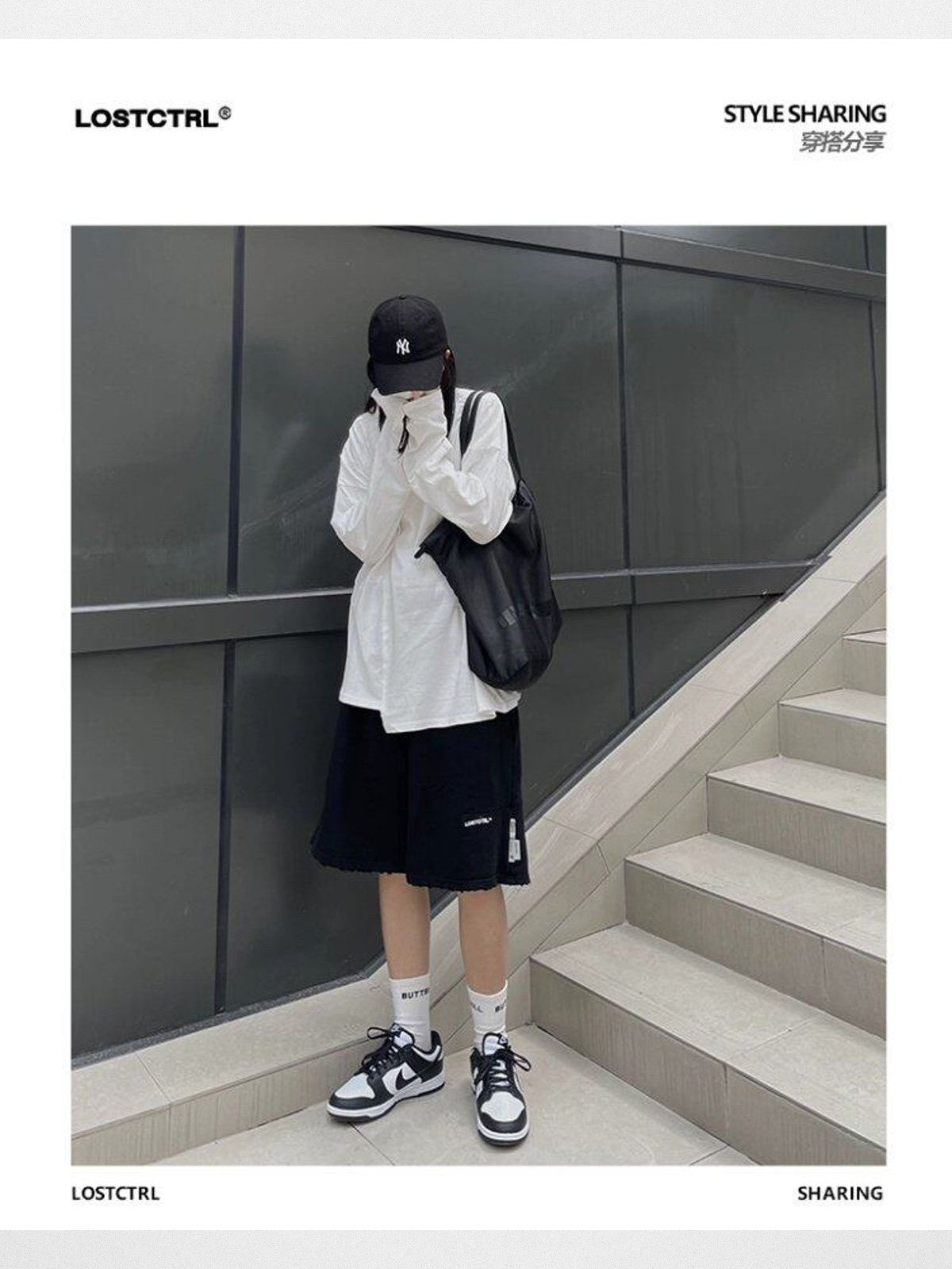 LOSTCTRL Raw Edge Embroidered Cotton Shorts in Black - Lifestyle