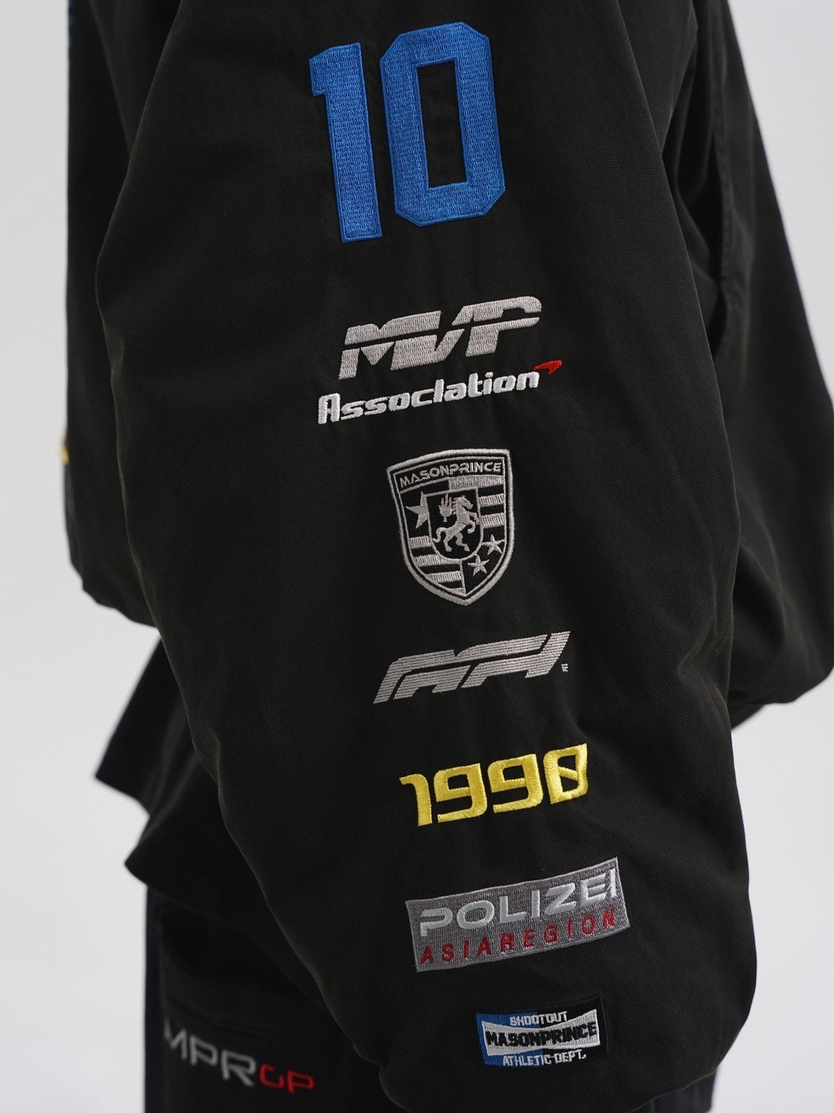 MasonPrince Hooded Racing Patch Puffer in Black - On Model