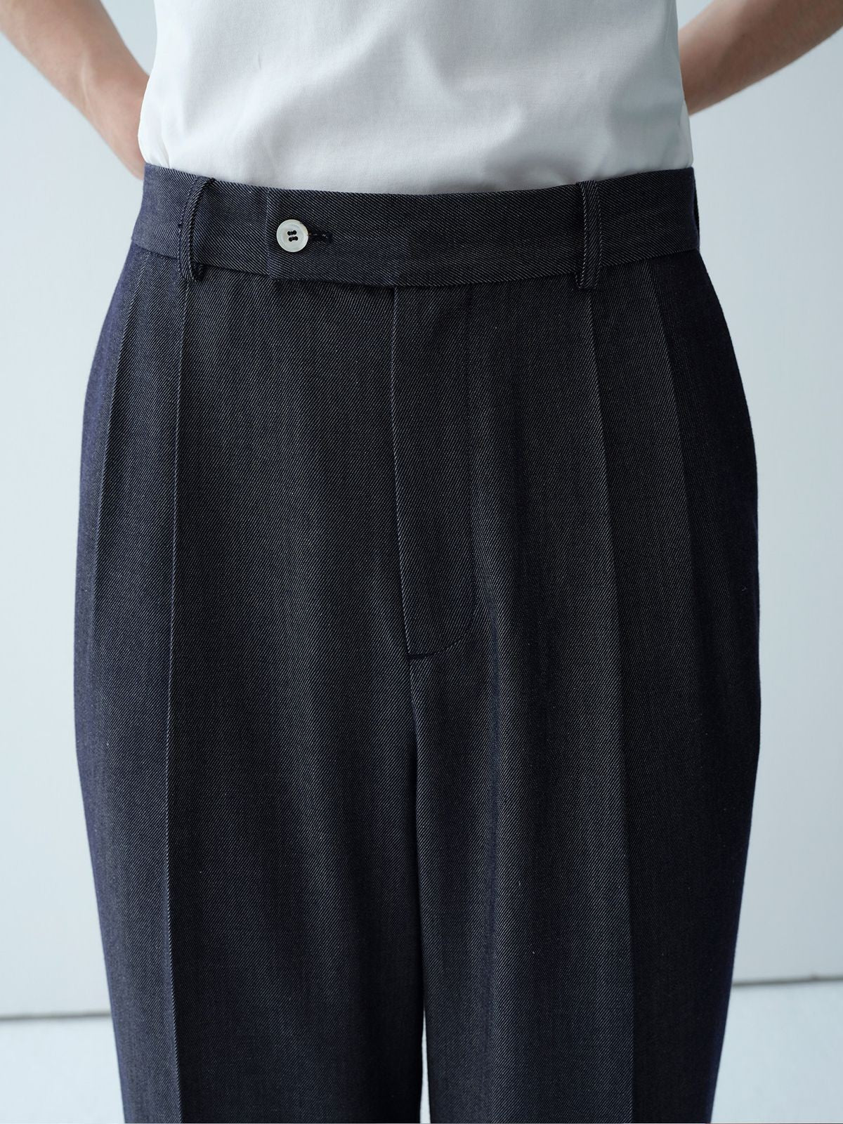 ROYA Pleated Silk Blend Denim Trousers in Blue - On Female Model