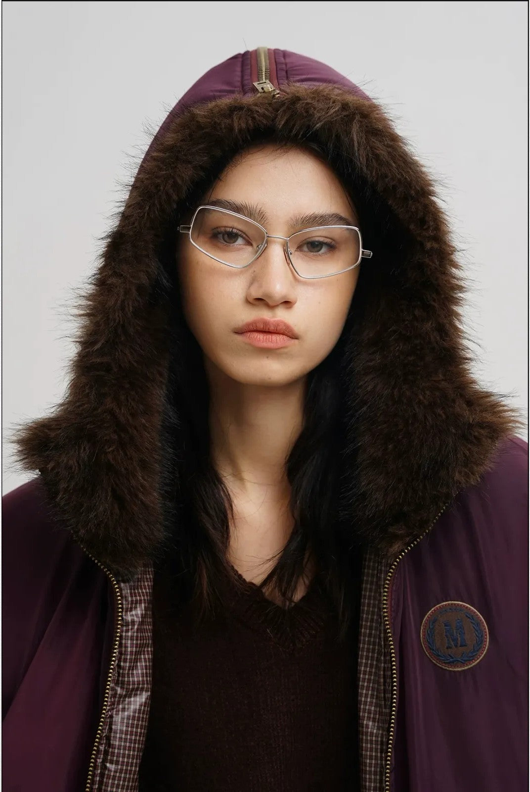 MASONPRINCE Faux Fur Hooded Puffer Bomber in Burgundy - On Model