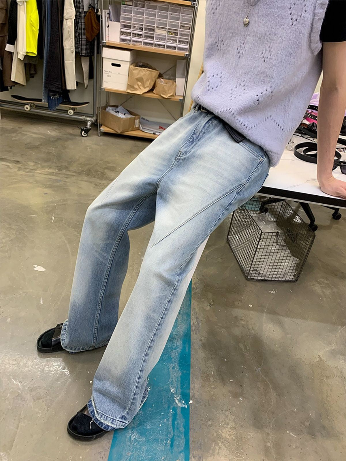 NeverSeez Distressed Washed Micro Flare Jeans in Blue - On Model