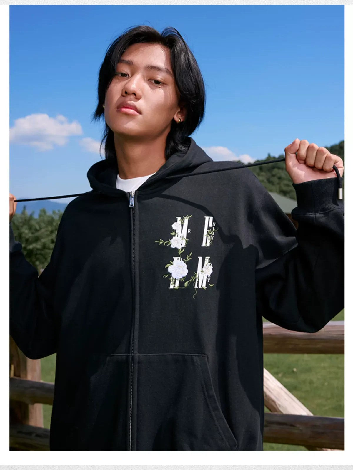 MEDM Camellia Embroidered Zip Hoodie in Black - On Male Model