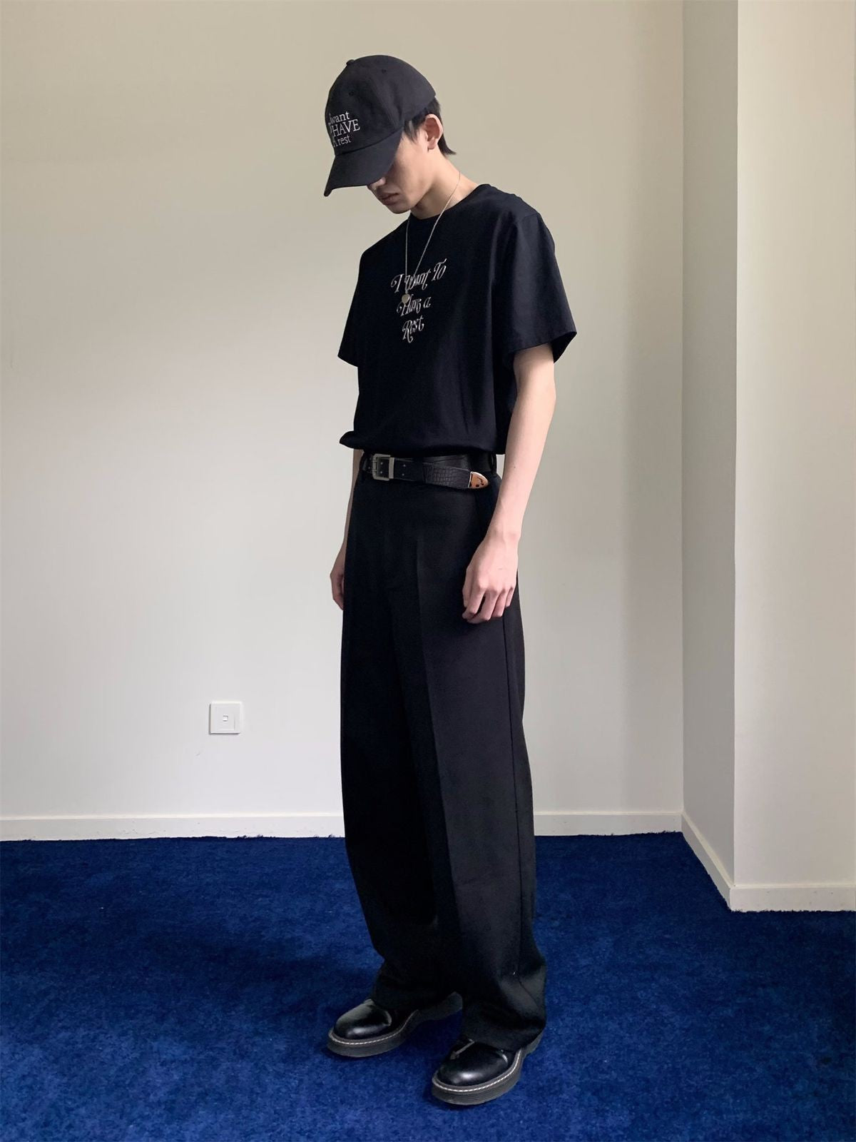 NeverSeez Embossed Script Cotton T Shirt in Black - On Male Model