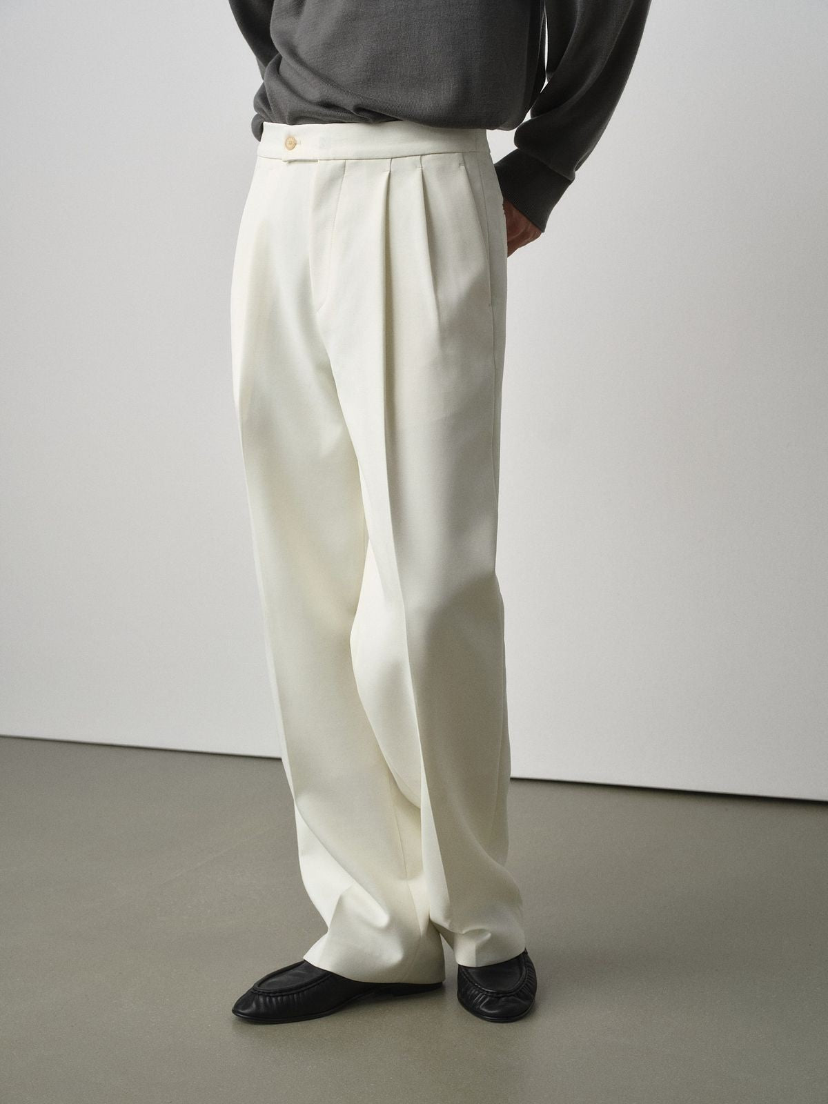 ROYA Pleated Acetate Wool Trousers in White - On Model
