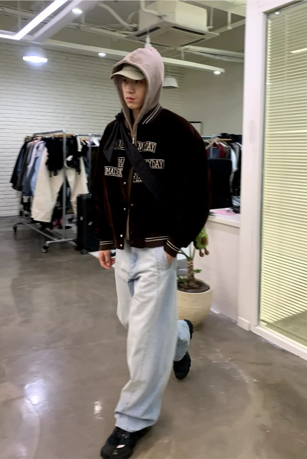 NeverSeez Velvet Corduroy Padded Varsity Jacket in Brown - On Model