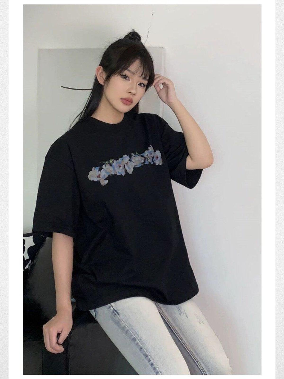 LOSTCTRL Camellia Graphic Print T Shirt in Black - On Female Model