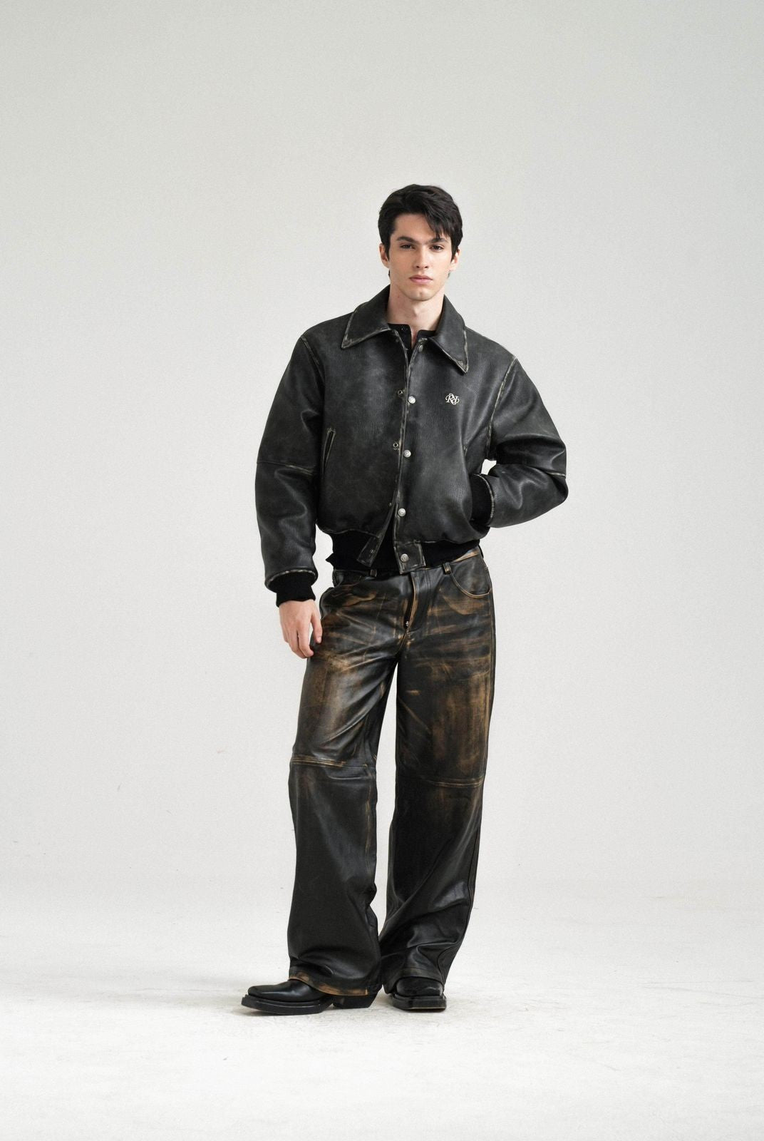 Retro 21 Distressed Faux Leather Padded Jacket in Black - On Model