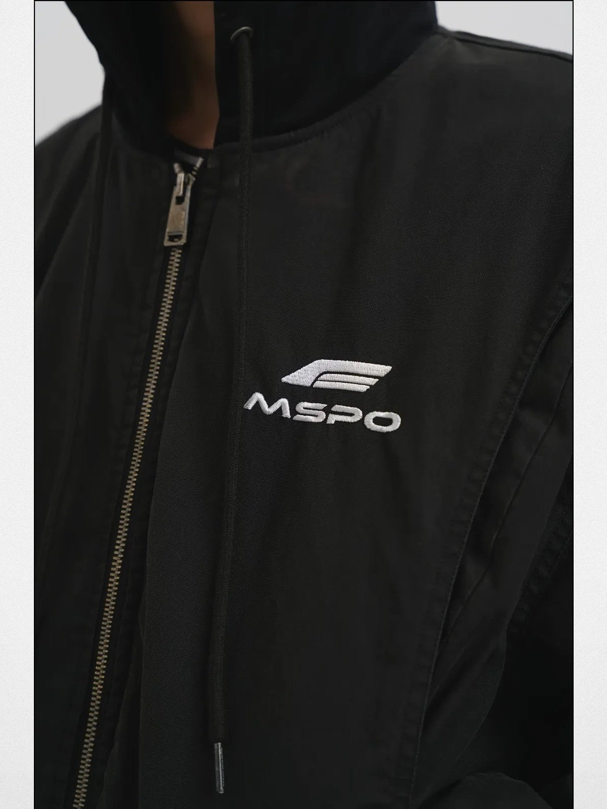 MASONPRINCE Hooded Racing Patch Puffer Jacket in Black - On Model