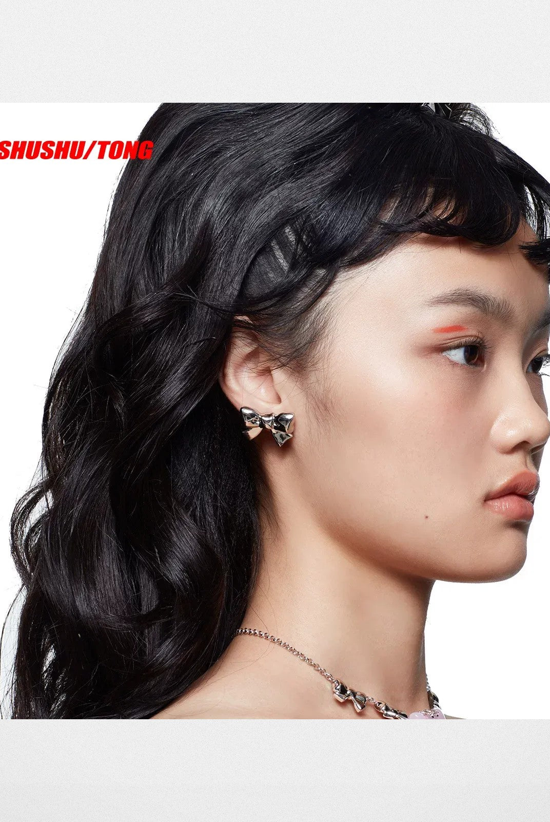 SHUSHU/TONG Crystal Pav Bow Earrings in Silver - On Model