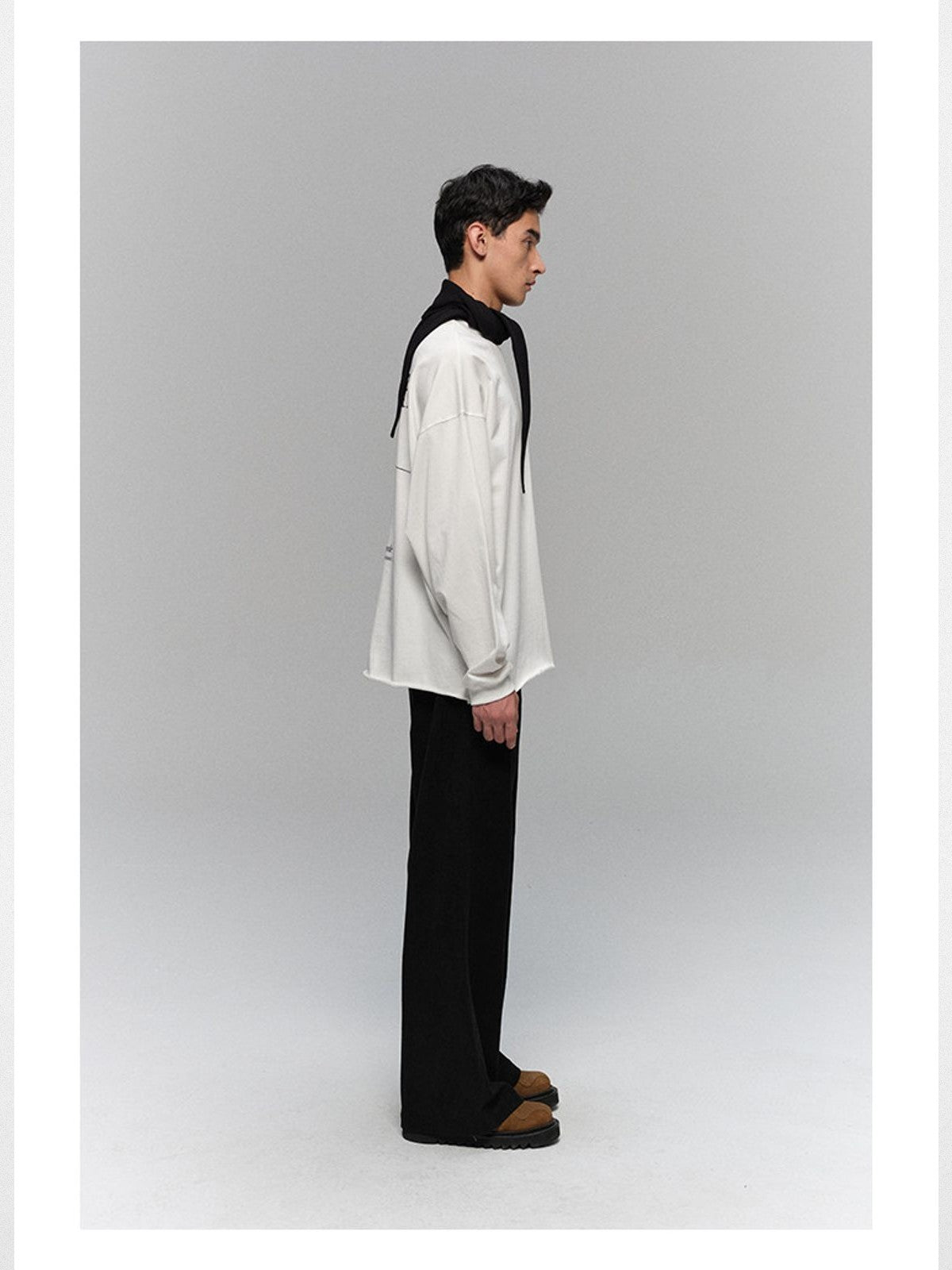 NANS Single Pleat Corduroy Micro Flare Trousers in Black - On Model