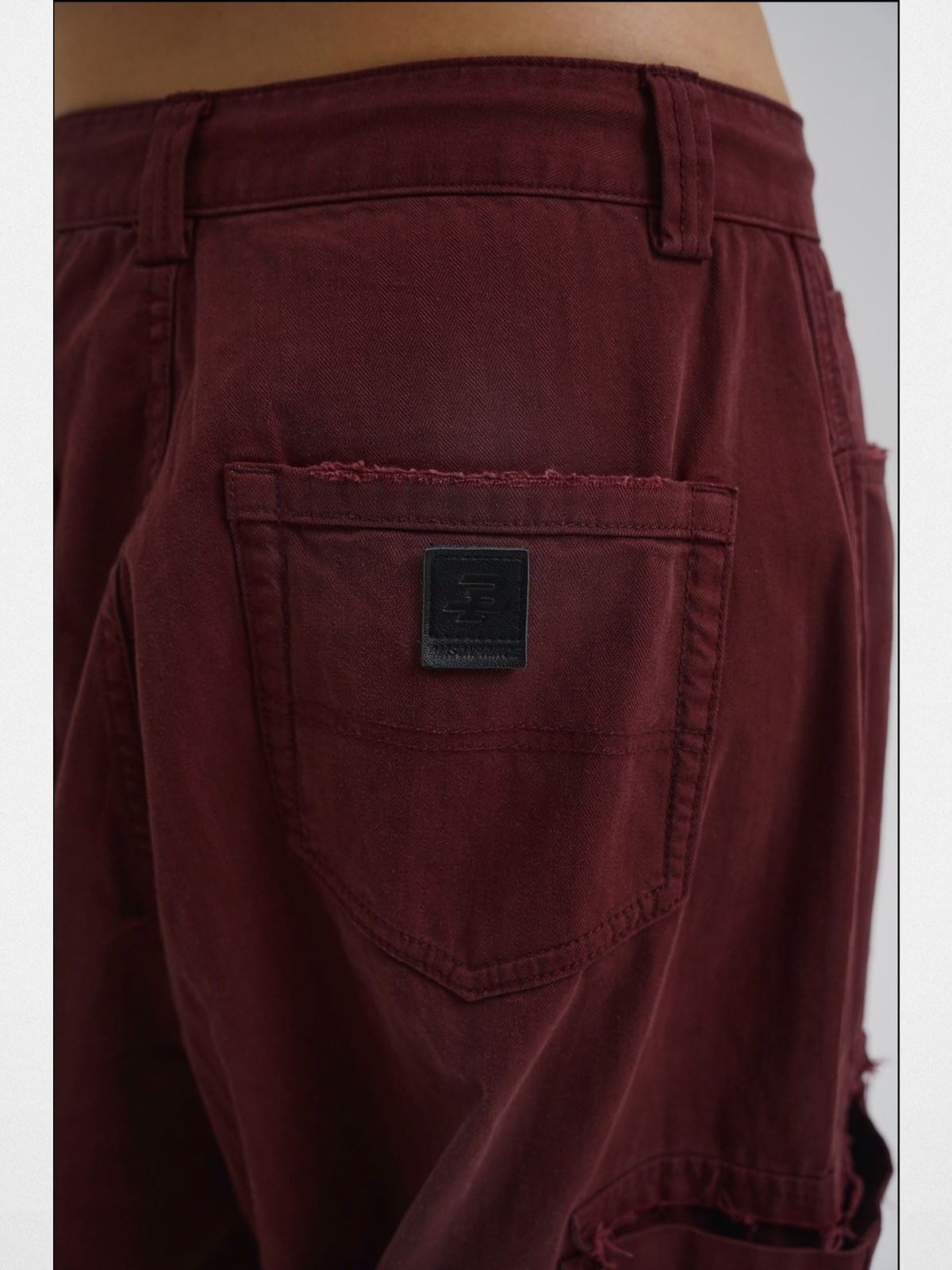 MasonPrince Distressed Wide Leg Cargo Pants in Burgundy - Detail