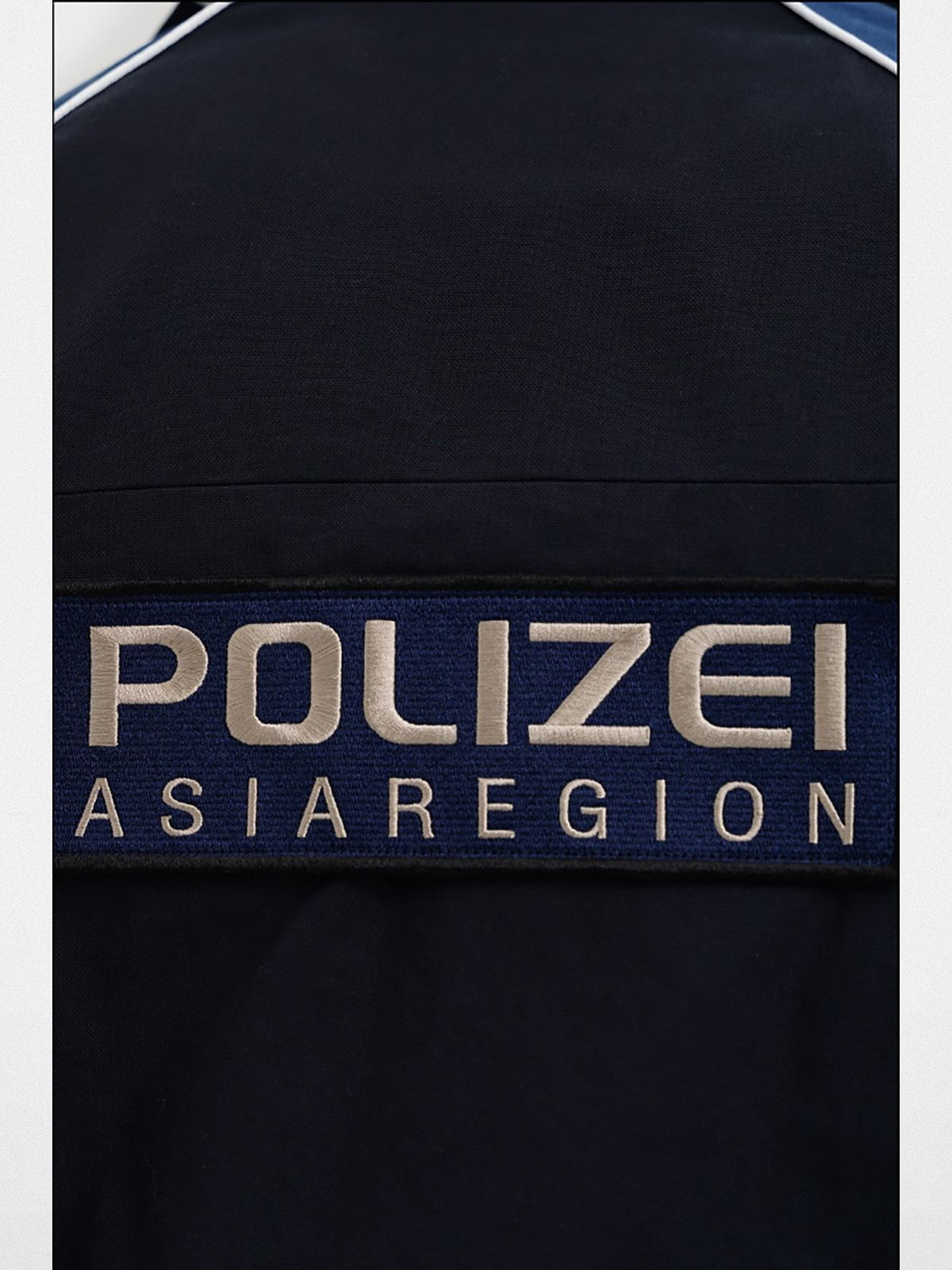 MASONPRINCE Color Blocked Badge Track Jacket in Blue - Detail #color_blue