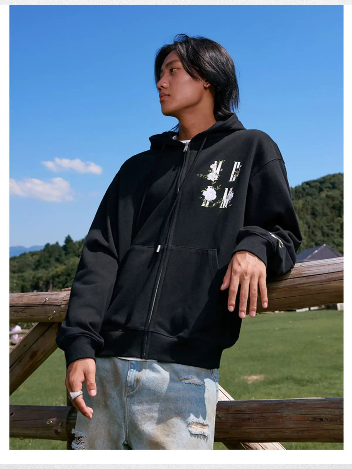 MEDM Camellia Embroidered Zip Hoodie in Black - On Male Model
