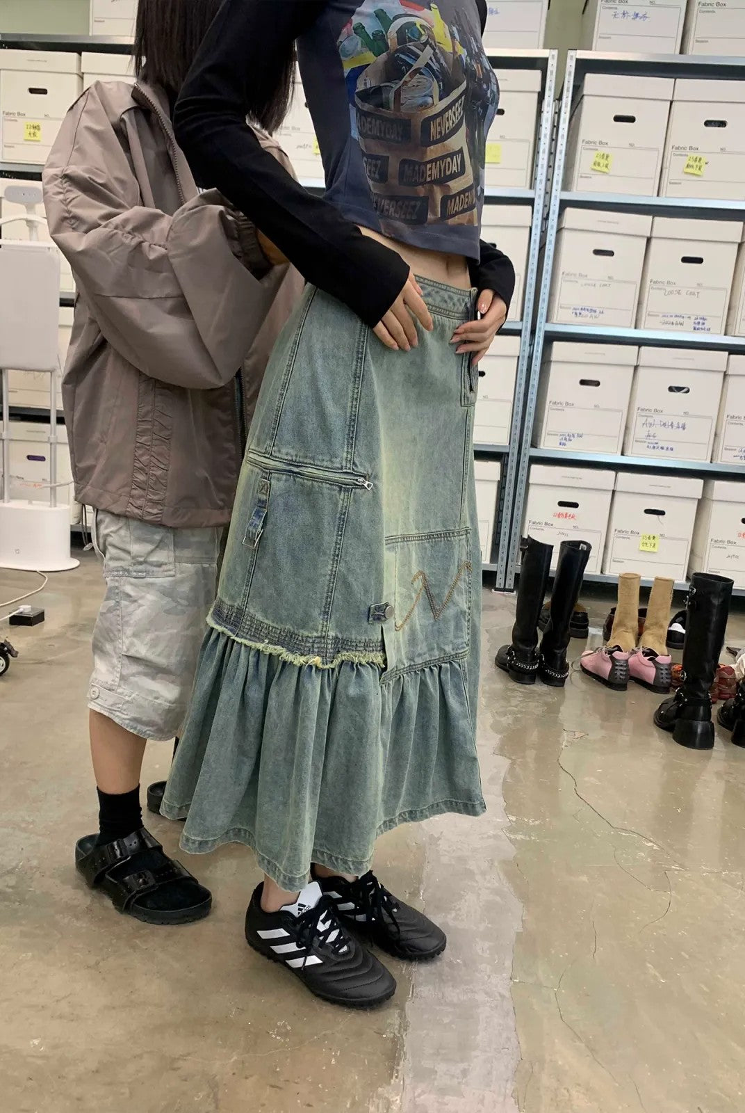 NeverSeez Asymmetric Vintage Wash Denim Skirt in Blue - On Model