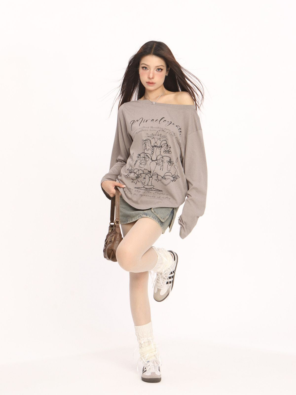 BIGGOLD STUDIO Graffiti Print Off Shoulder Tee in Beige - On Model #color_beige