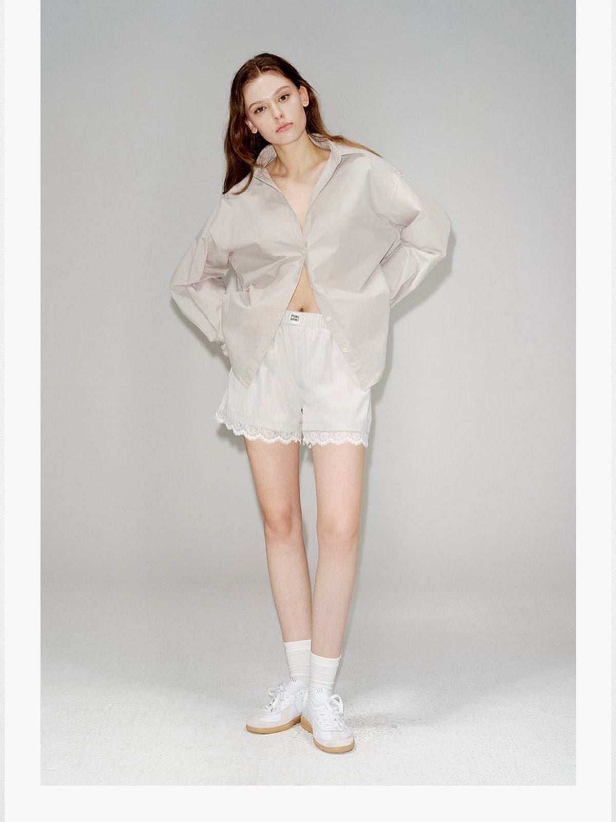 PUKI Lace Hem Track Shorts in Gray - On Model