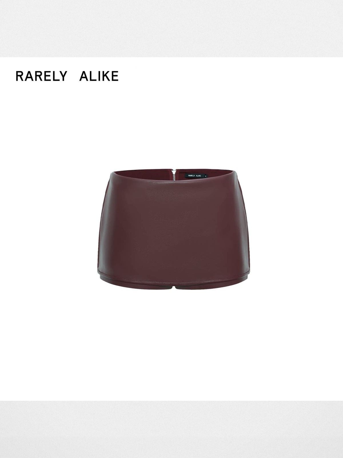 rarely alike Side Zip Faux Leather Mini Skort in Burgundy