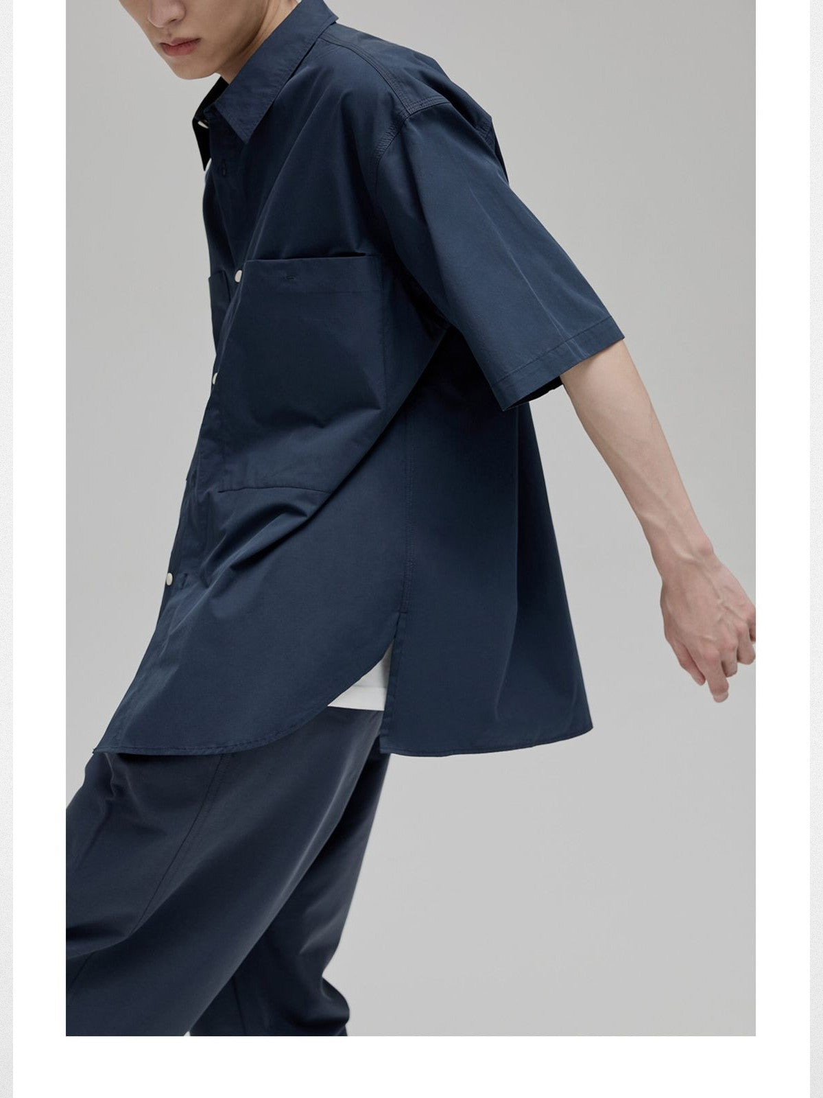 NANS Sand Washed Cotton Curved Hem Shirt in Navy Blue - On Model