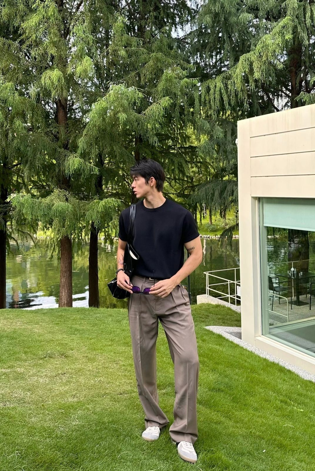 Roolrren Homme Pleated Wool Trousers in Beige - On Model