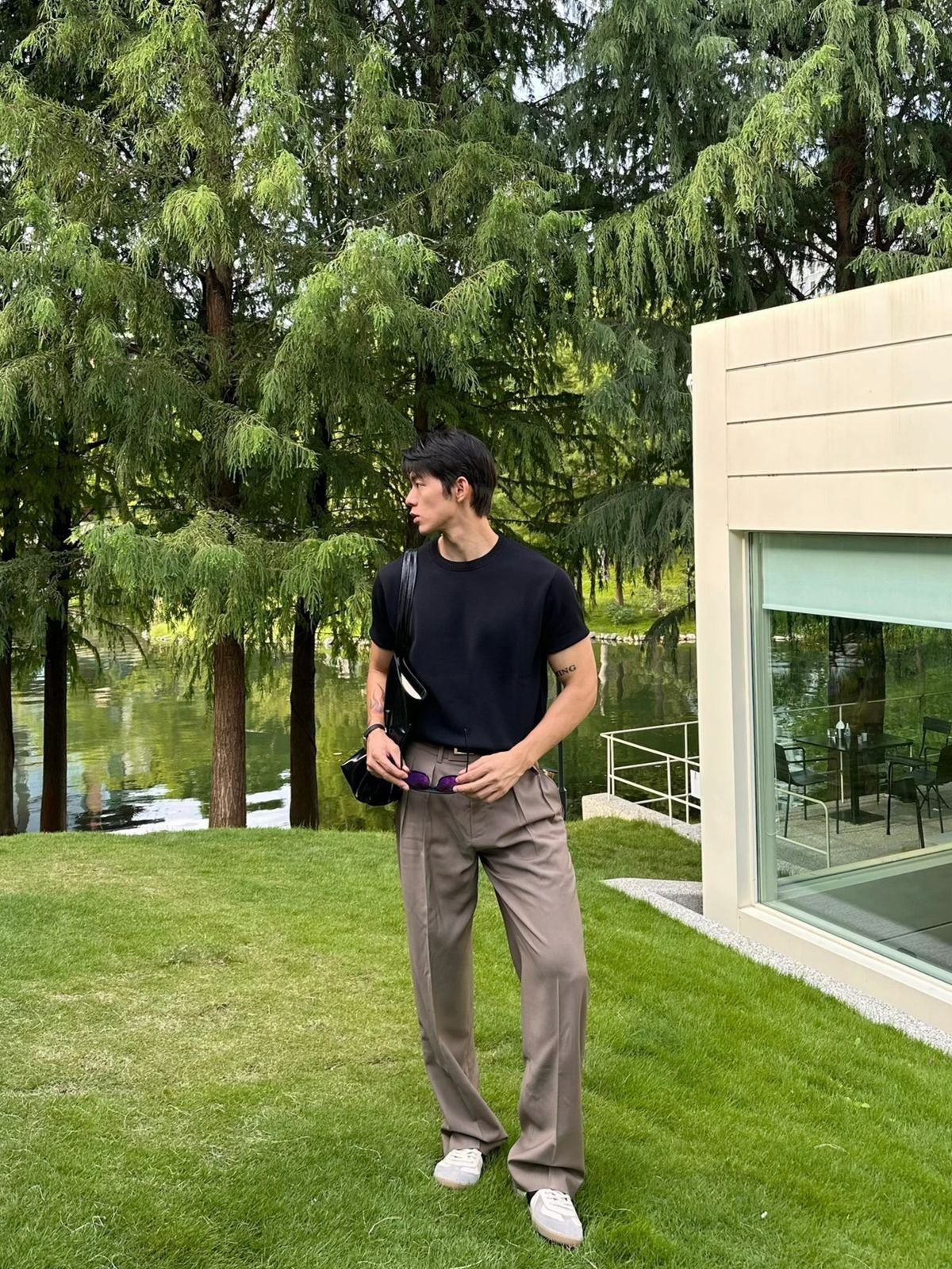 Roolrren Homme Pleated Wool Trousers in Beige - On Model