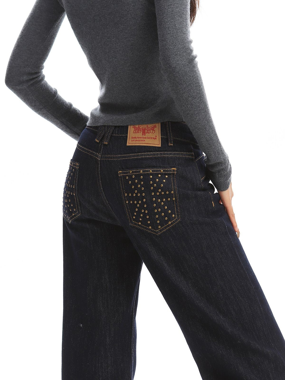BIGGOLD STUDIO Asymmetric Waist Straight Leg Jeans in Navy Blue - On Model #color_navy-blue