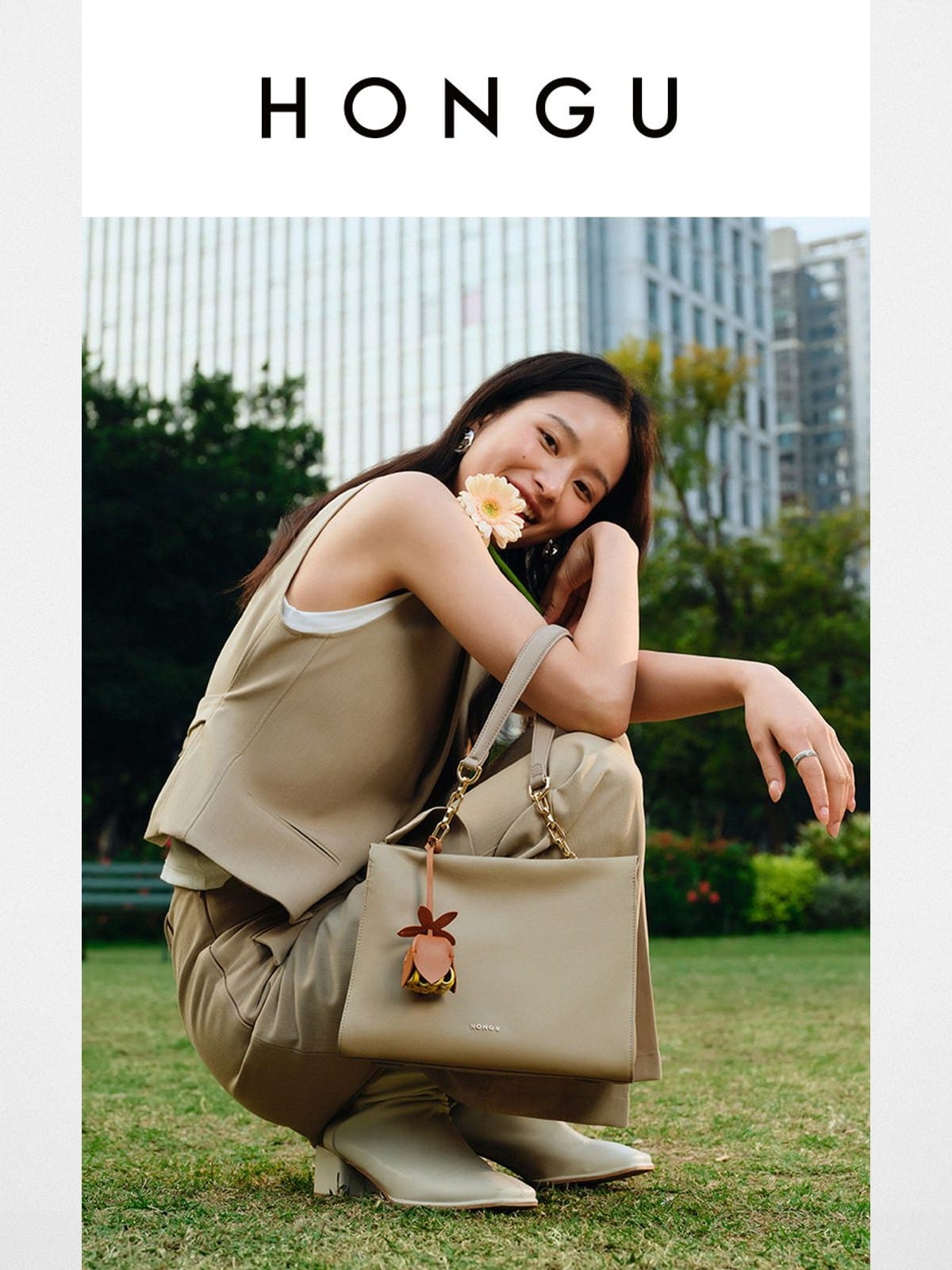 HONGU Leather Chain Strap Shoulder Bag in Beige - On Female Model