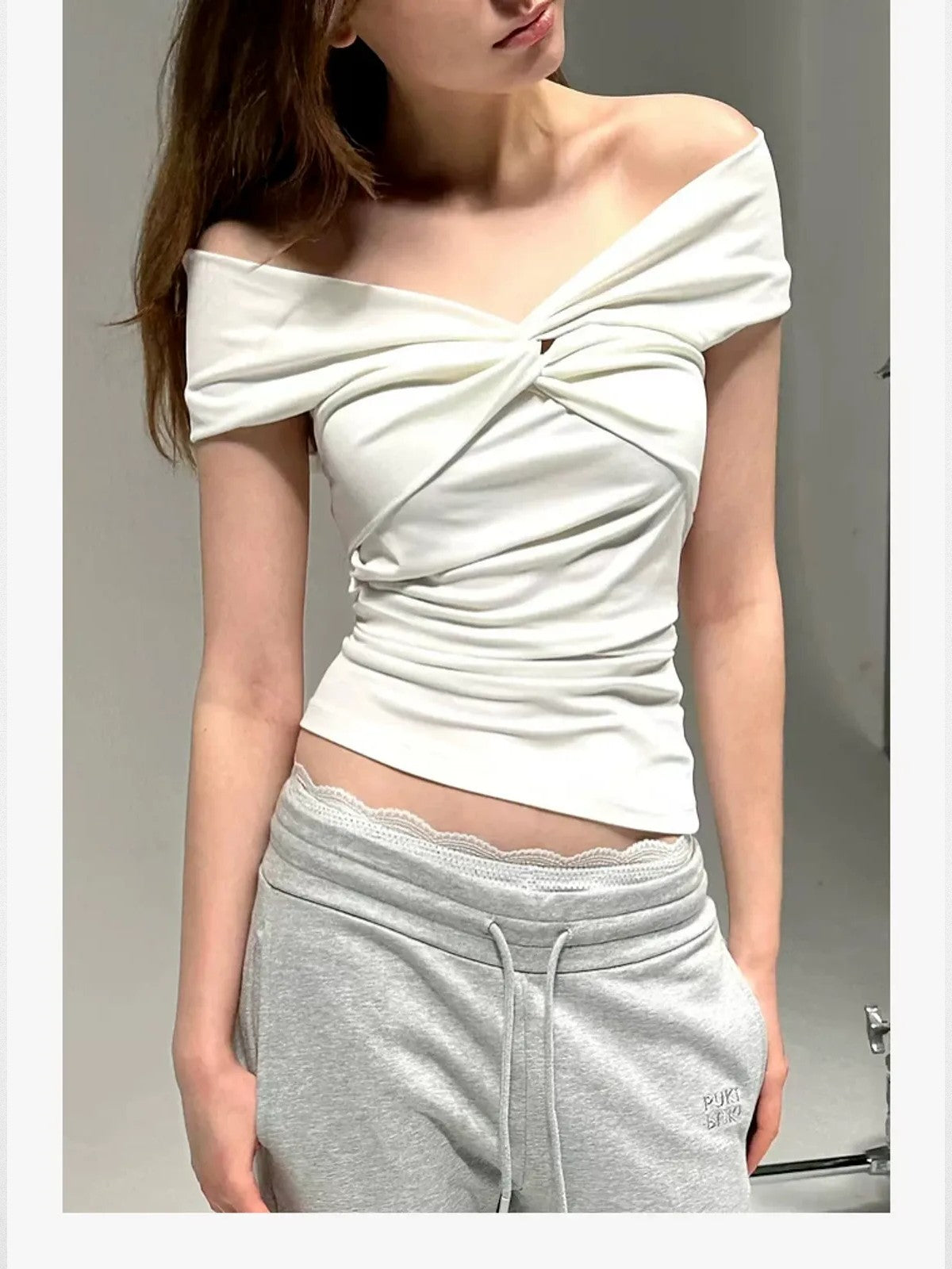 PUKI Twisted Knot Off Shoulder Top in White - On Model