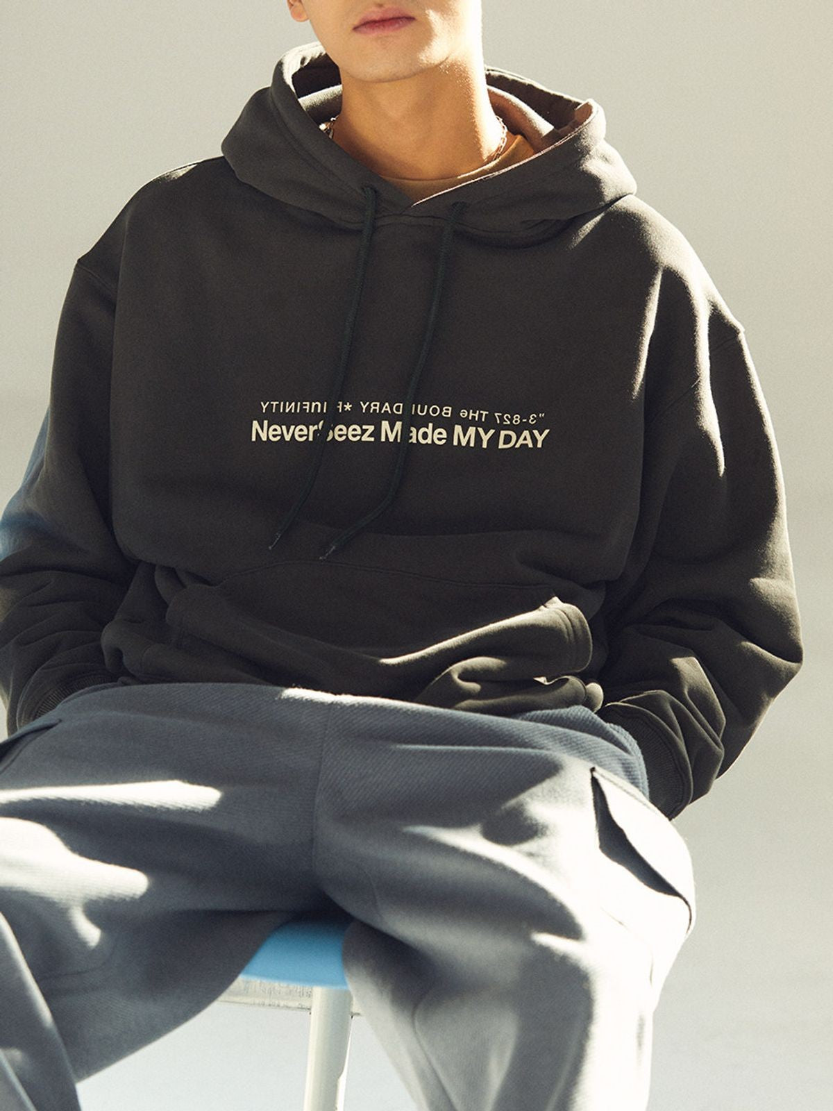 NeverSeez Anniversary Logo Print Hoodie in Green - On Model