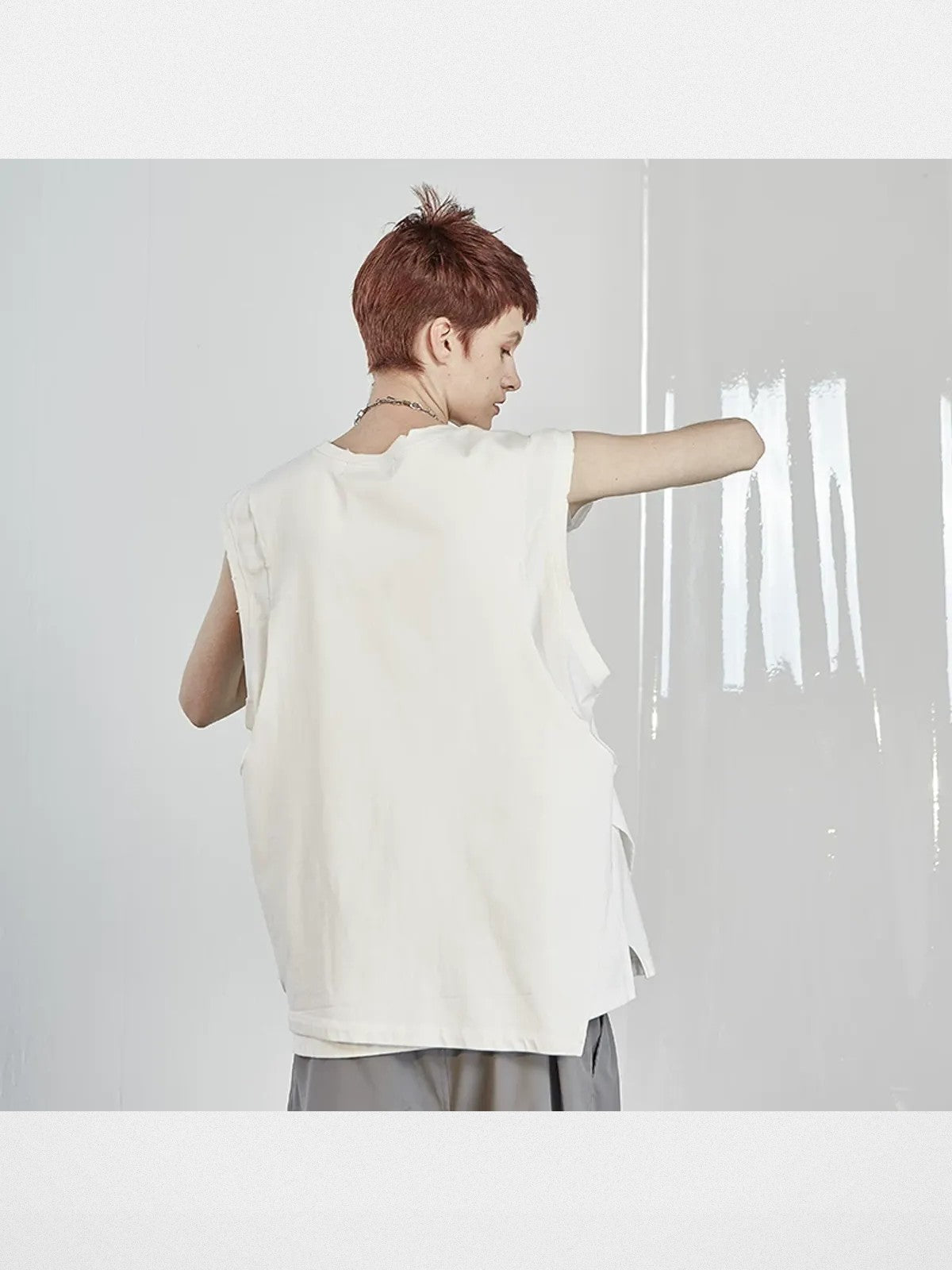 LOSTCTRL Asymmetric Distressed Layered Tank in White - On Female Model