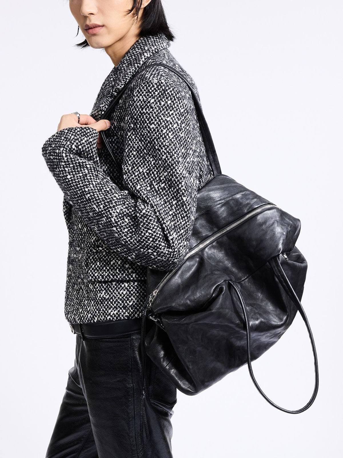 Grotto Vegetable Tanned Sheepskin Tote in Black - On Male Model