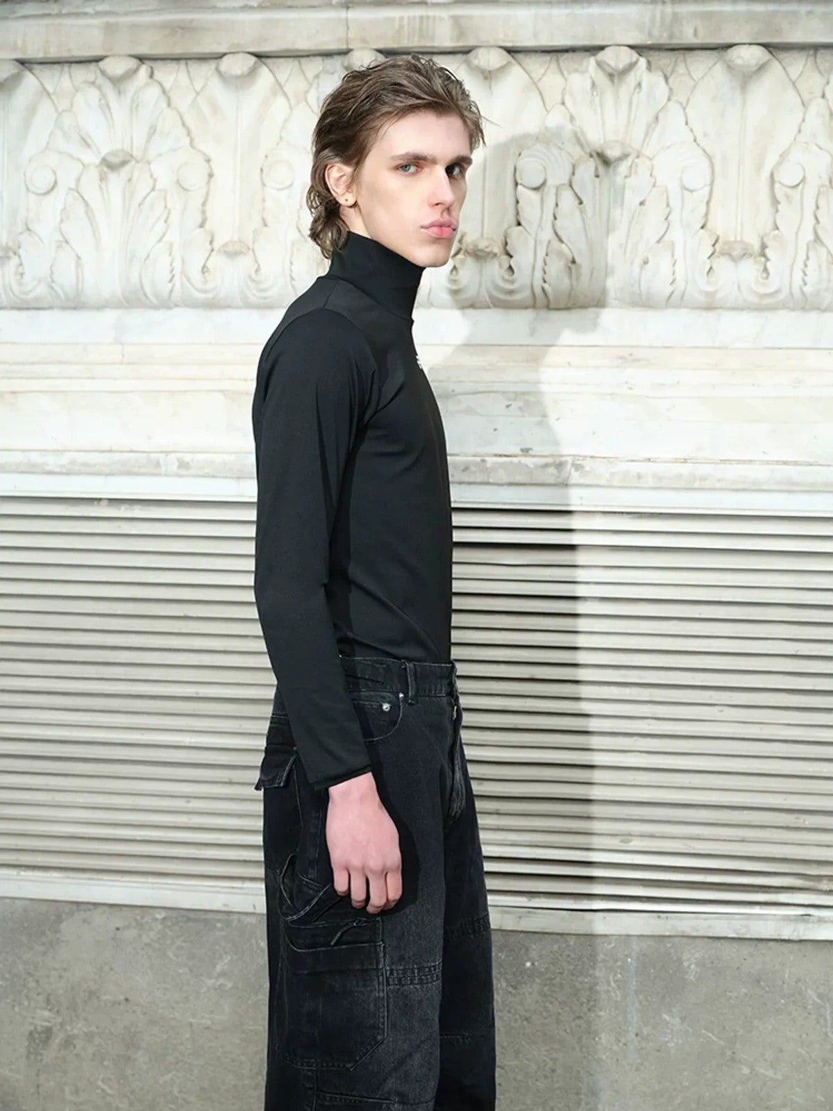 TRIANGLE PROJECT Logo High Neck Long Sleeve Top in Black - On Model