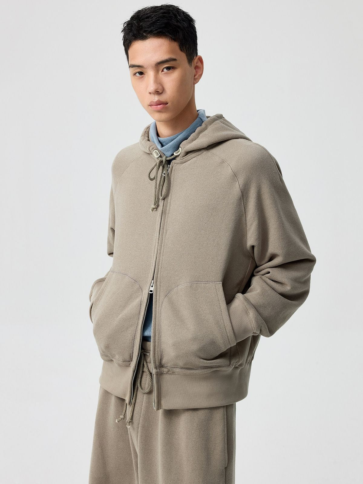Simple Project Cotton Blend Zip Up Hoodie in Beige - On Male Model