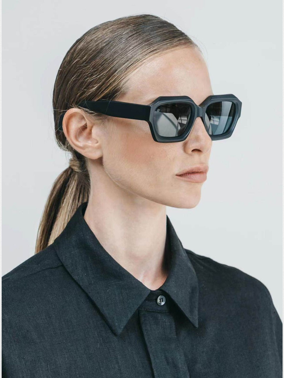 FUTURE UPDATE Chunky Geometric Sunglasses in Black - On Female Model