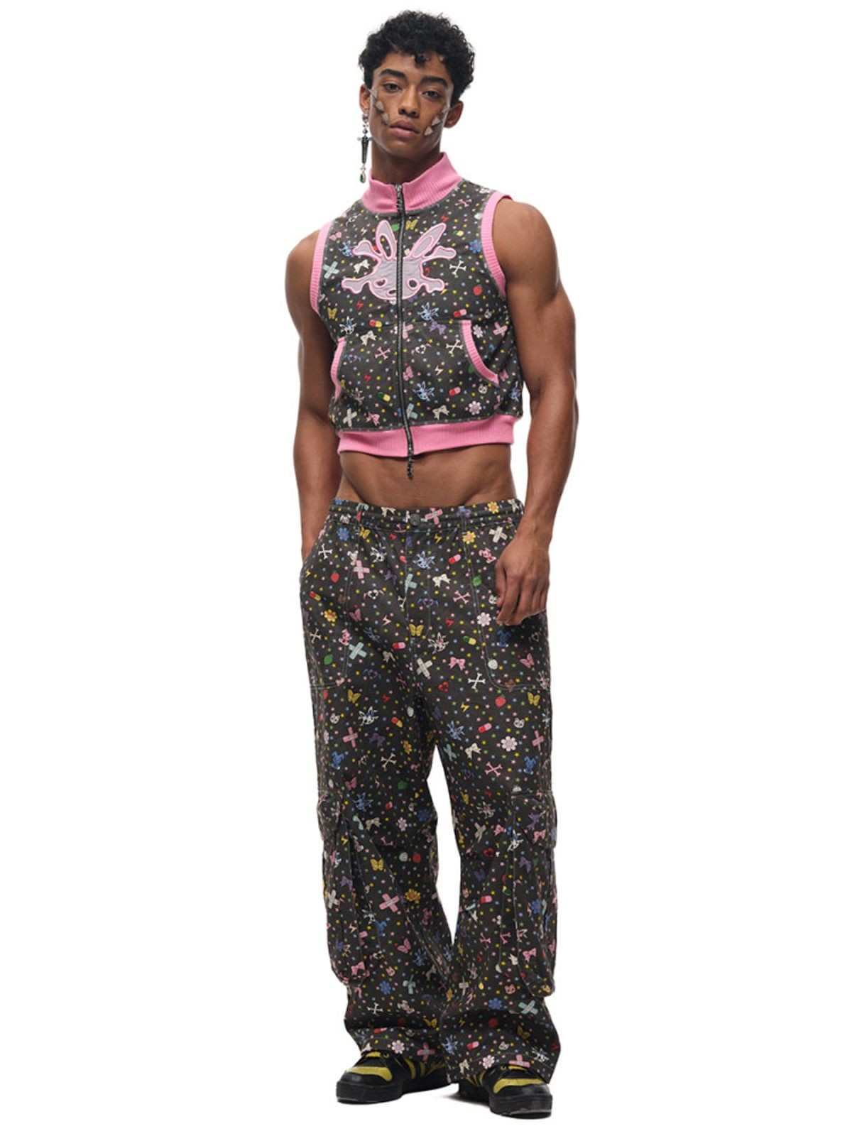 CFIERCE Sticker Print Wide Leg Cargo Pants in Black - On Male Model