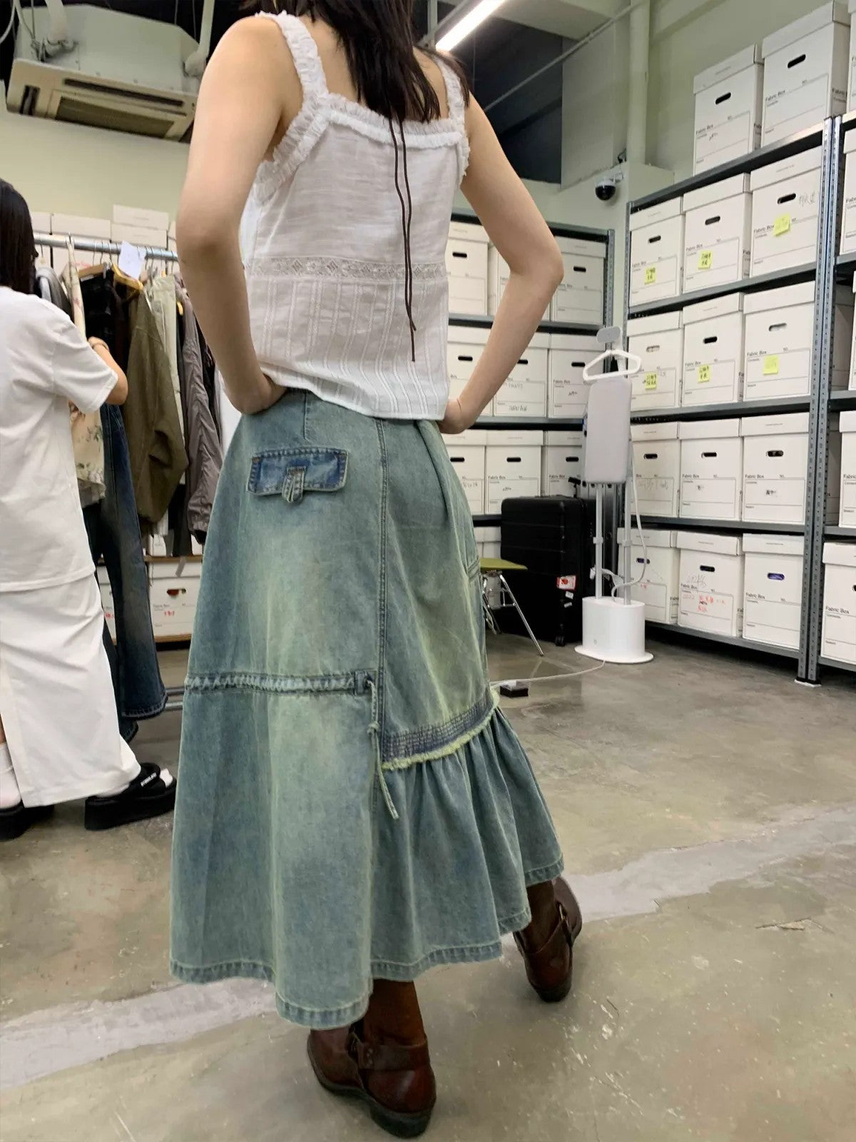 NeverSeez Asymmetric Vintage Wash Denim Skirt in Blue - On Model