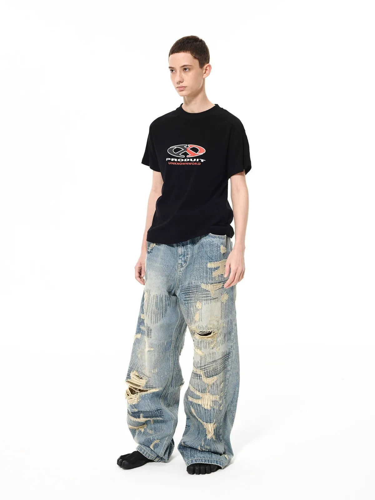 UNKNOWNWORLD Heavyweight Distressed Wide Leg Jeans in Blue - On Male Model