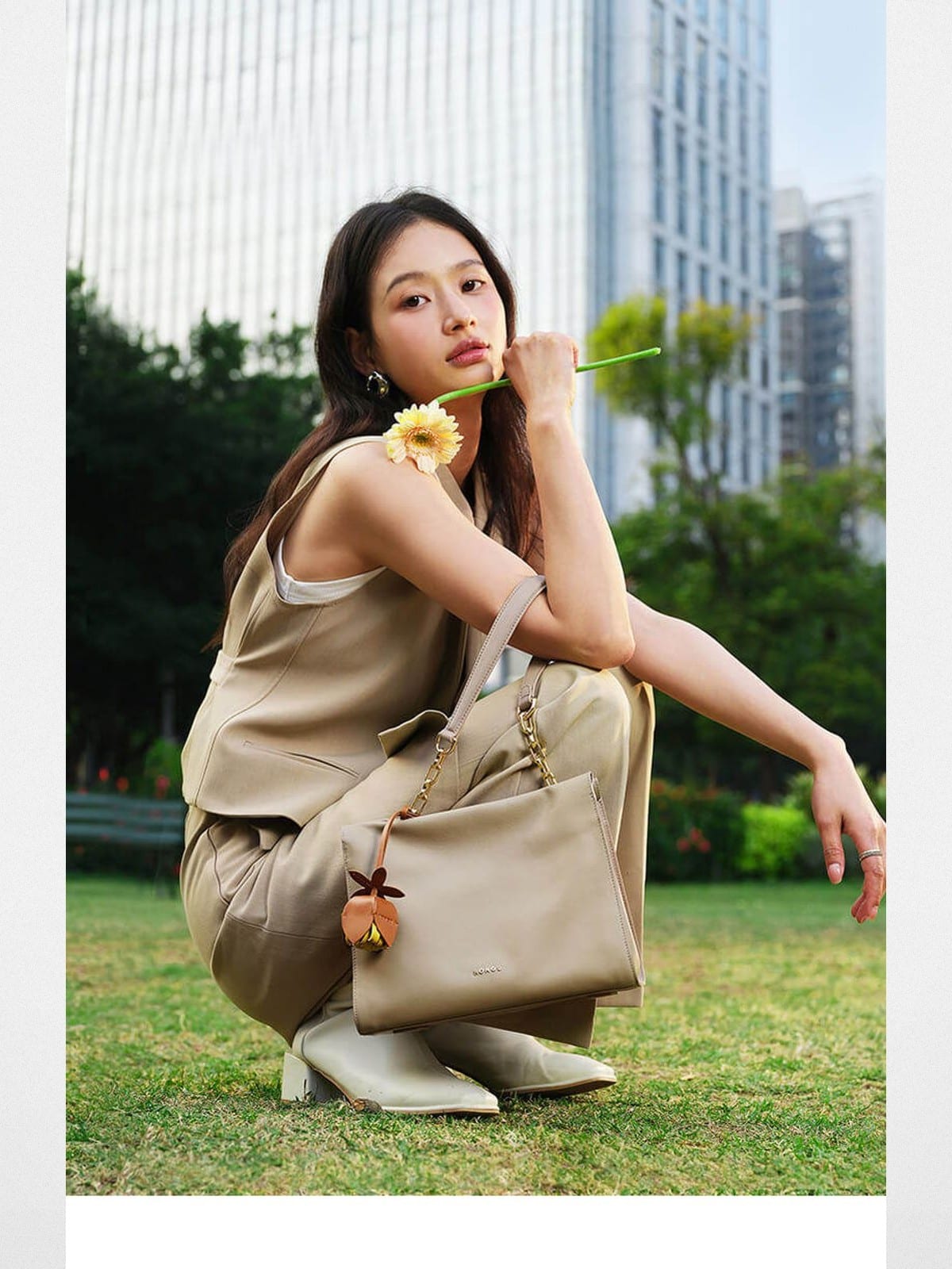 HONGU Leather Chain Strap Shoulder Bag in Beige - On Female Model